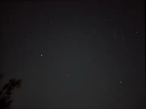 Night sky with meteor streak